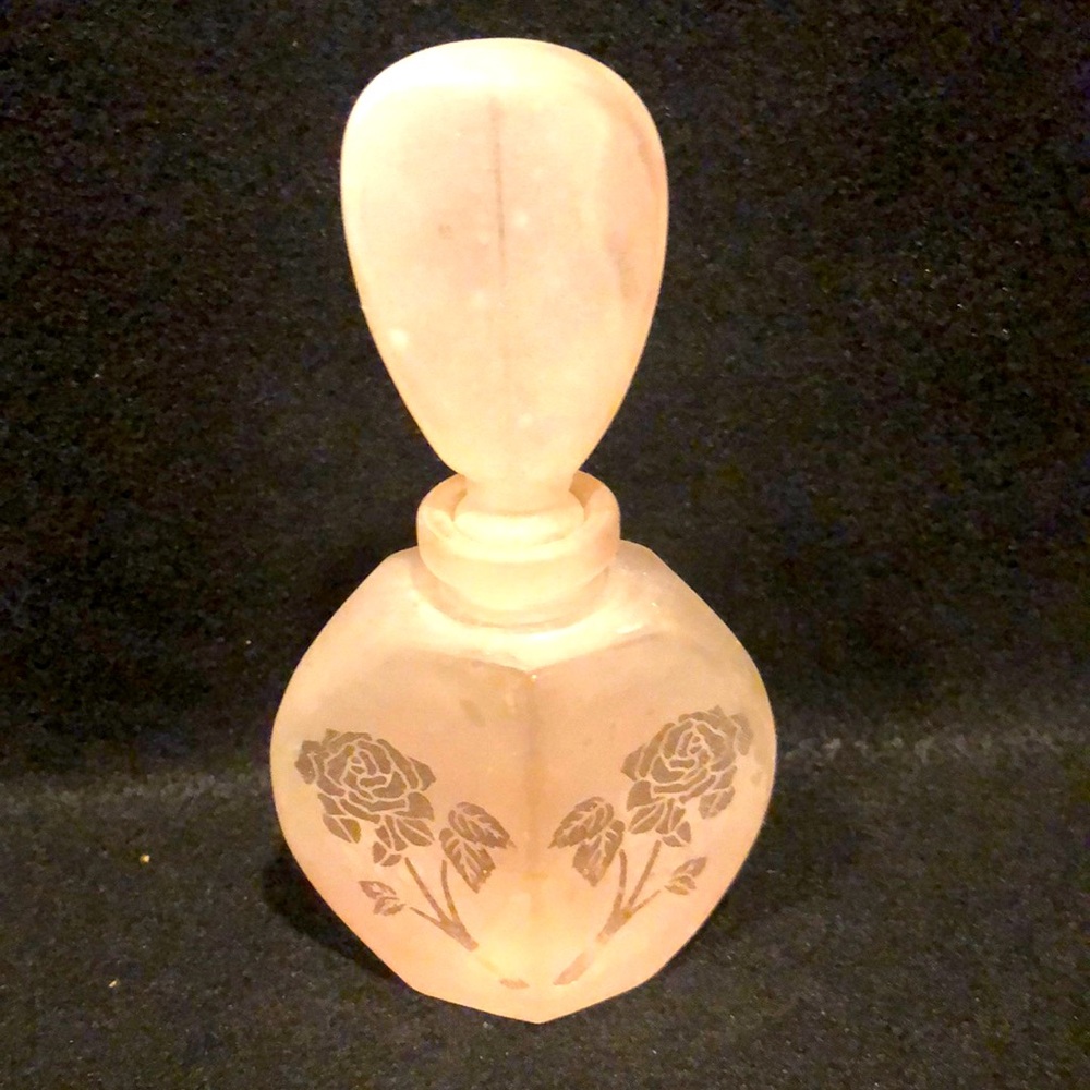 VINTAGE PERFUME BOTTLE. COLLECTABLE. FROSTED PINK WITH ETCHED ROSES